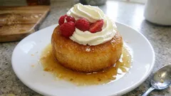 Grandma’s Baba au Rhum: light sponge soaked in vanilla-rum syrup with Chantilly