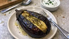 Oven-baked aubergine that turns meltingly soft — just olive oil and herbs